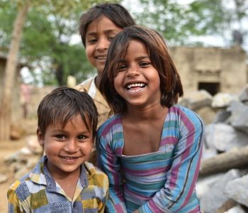 stock-photo-smiling-faces-young-children-smiling-and-having-fun-from-rural-part-of-india-639450937-transformed